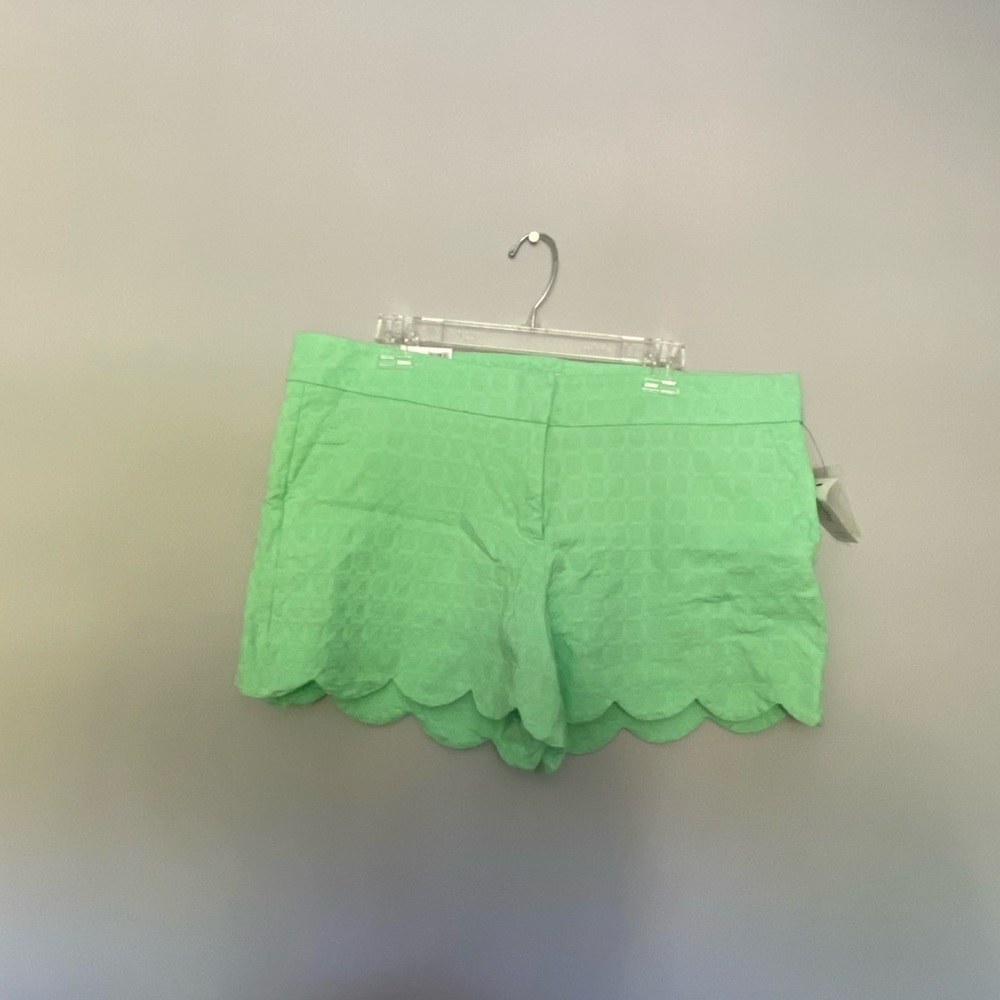 Green scalloped chino shorts